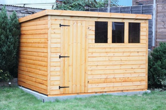 Couler une dalle en béton sous un abri de jardin