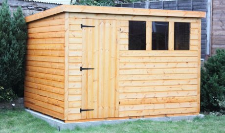 Couler une dalle en béton sous un abri de jardin